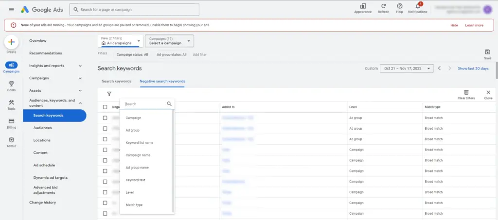 Google Ads interface showing negative search keywords section with filter options by campaign, ad group and match type