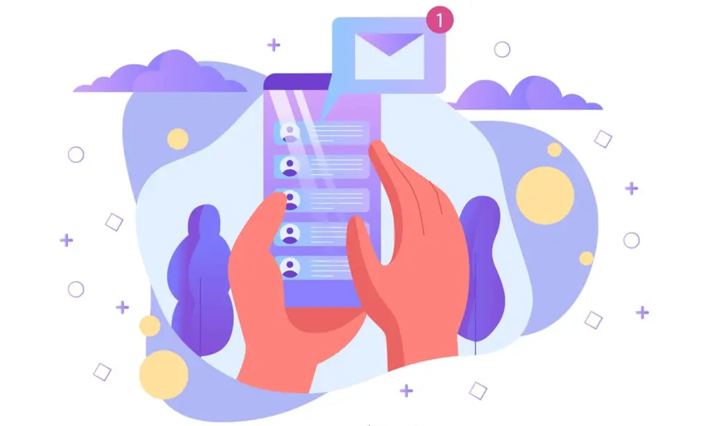Hands holding a phone with a new message notification, representing email campaigns driving conversions