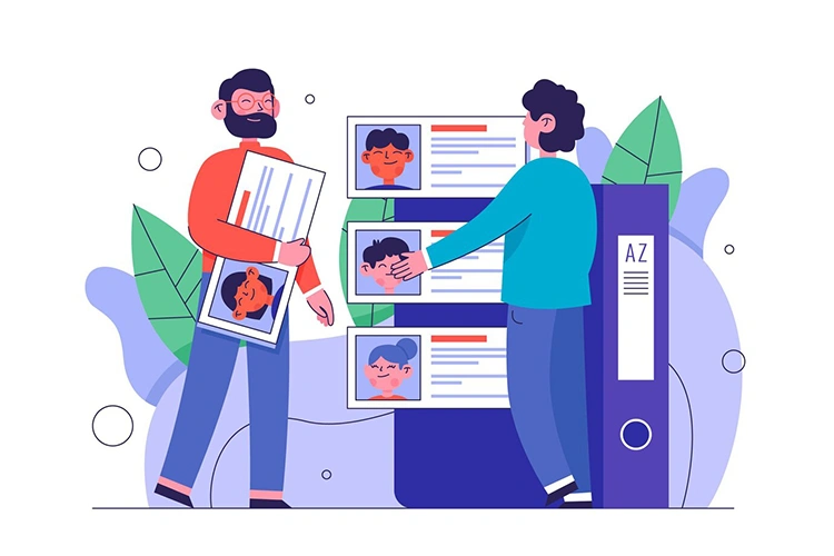 Illustration of two people organizing customer profile cards, representing audience segmentation and buyer persona creation