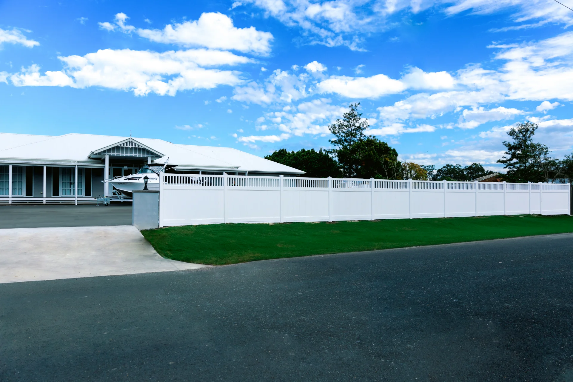 White PVC fencing installed at a Queensland home